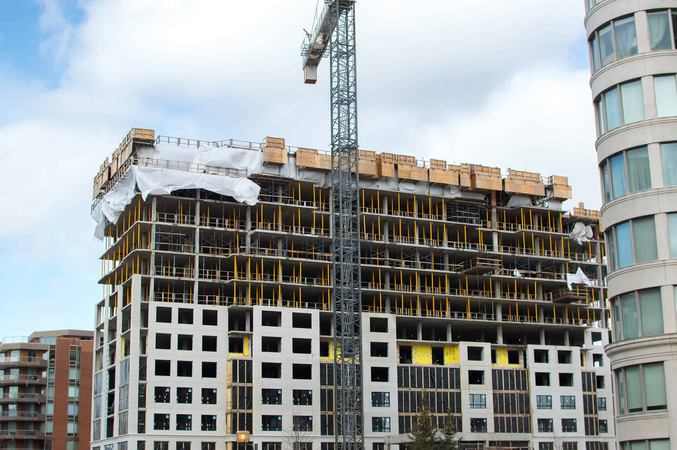 Construction,Of,The,Modern,Condo,Buildings,With,Huge,Windows,And